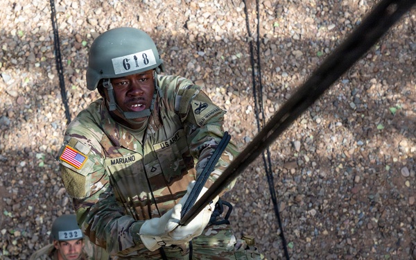 JTF-SB service members rappel from bridge during Air Assault training