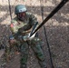 JTF-SB service members rappel from bridge during Air Assault training