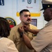 Hospital Corpsman Pinned to Senior Chief Petty Officer by Family and Leadership