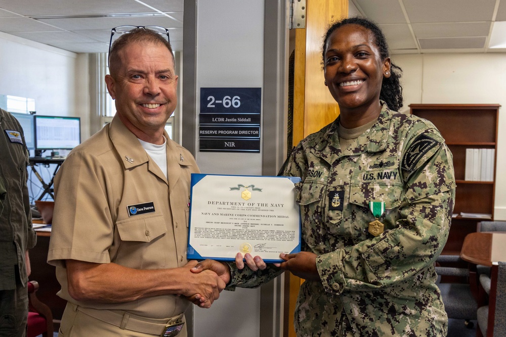 NETC holds End of Tour for MMCS Roberson