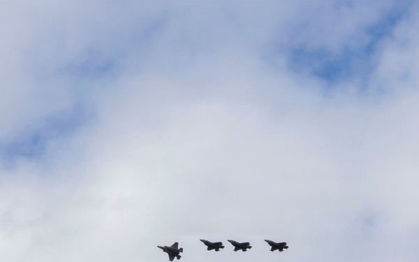 U.S. service members unload ordnance from aircraft participating in exercise Red Flag-Alaska