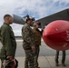 U.S. service members unload ordnance from aircraft participating in exercise Red Flag-Alaska