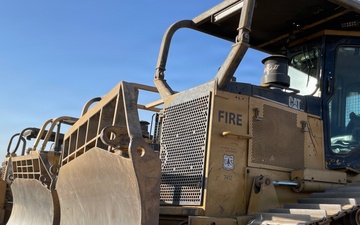 Bulldozers of Fire: Heavy equipment fighting and mitigating fire