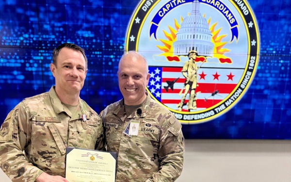 Presenting Meritorious Service Medal