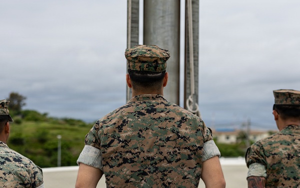 Marines and Japanese Base Security Forces raise the Colors at Camp Foster