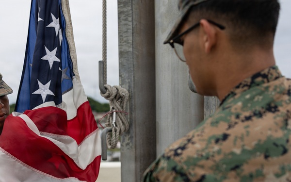 Marines and Japanese Base Security Forces raise the Colors at Camp Foster