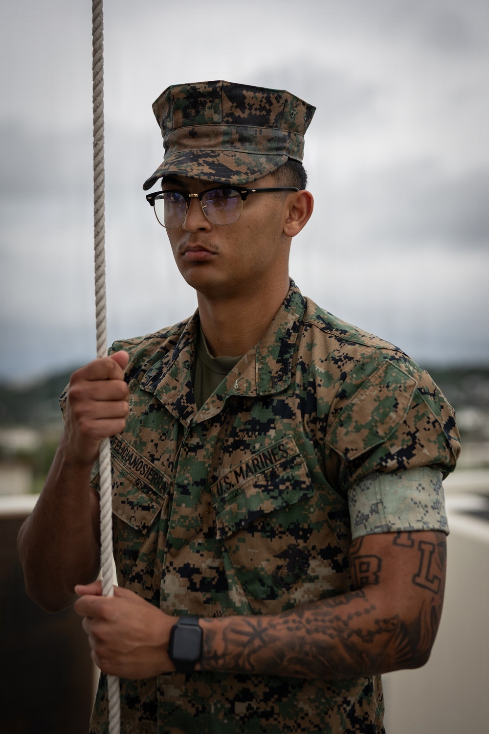 Marines and Japanese Base Security Forces raise the Colors at Camp Foster