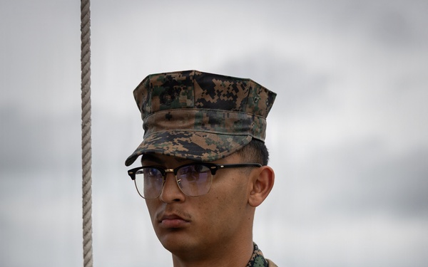 Marines and Japanese Base Security Forces raise the Colors at Camp Foster