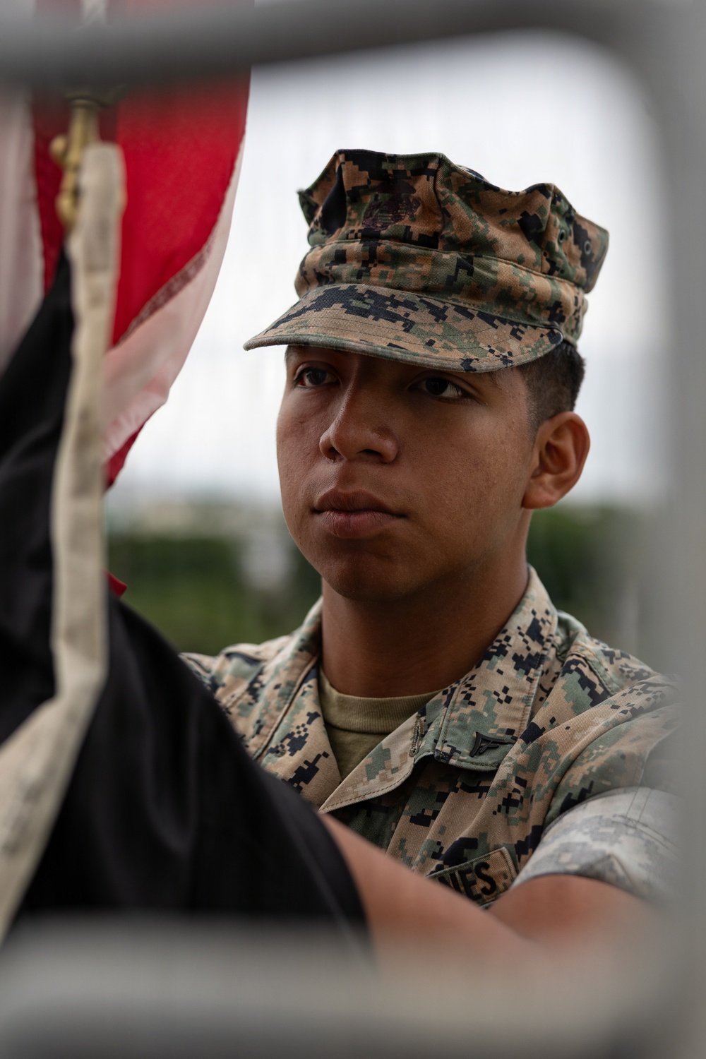 Marines and Japanese Base Security Forces raise the Colors at Camp Foster
