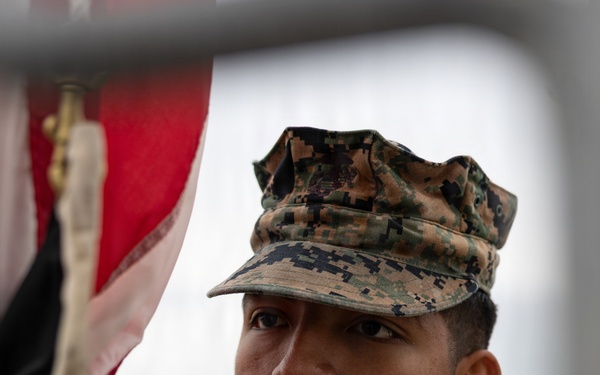 Marines and Japanese Base Security Forces raise the Colors at Camp Foster