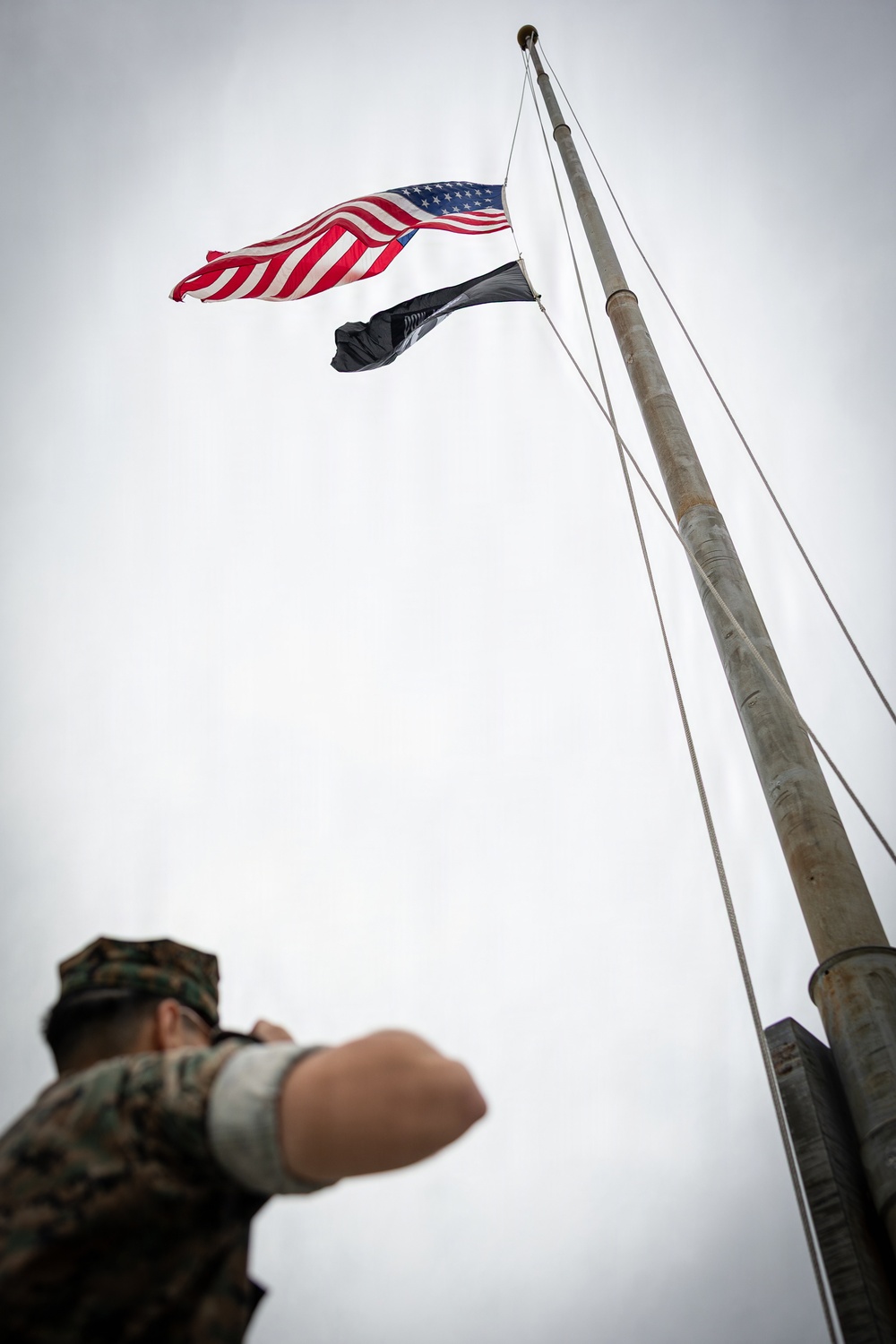 Marines and Japanese Base Security Forces raise the Colors at Camp Foster