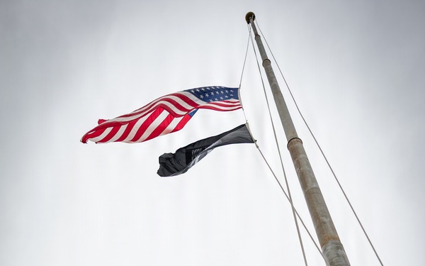 Marines and Japanese Base Security Forces raise the Colors at Camp Foster