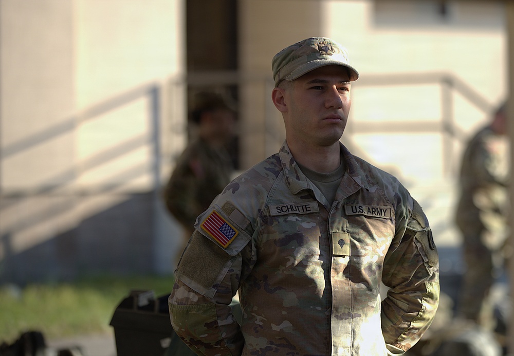 U.S. Army Soldier Schutte Stands at Attention During Military Formation