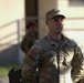 U.S. Army Soldier Schutte Stands at Attention During Military Formation
