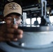 USS Mitscher (DDG 57) Sailor stands watch in ship bridge
