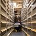 USS Mitscher (DDG 57) Sailor takes inventory in supply room