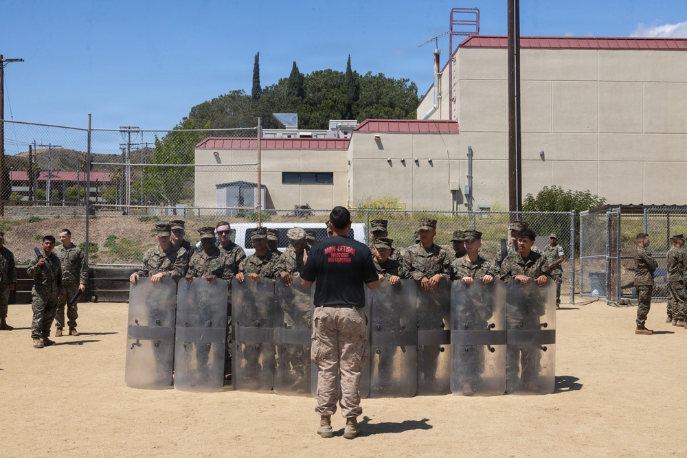 U.S. Marines with 2nd Bn., 5th Marines participate in non-lethal weapons course