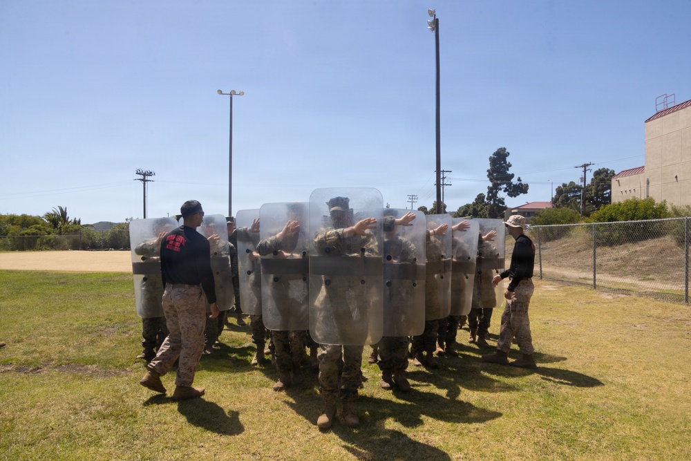 U.S. Marines with 2nd Bn., 5th Marines participate in non-lethal weapons course