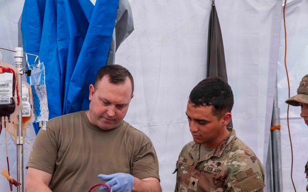 Balikatan 2026: 25th ID medics are trained on blood transfusions by 848th FRSD before a live fire exercise in the Philippines
