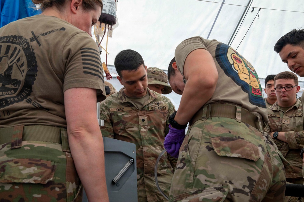 Balikatan 2026: 25th ID medics are trained on blood transfusions by 848th FRSD before a live fire exercise in the Philippines