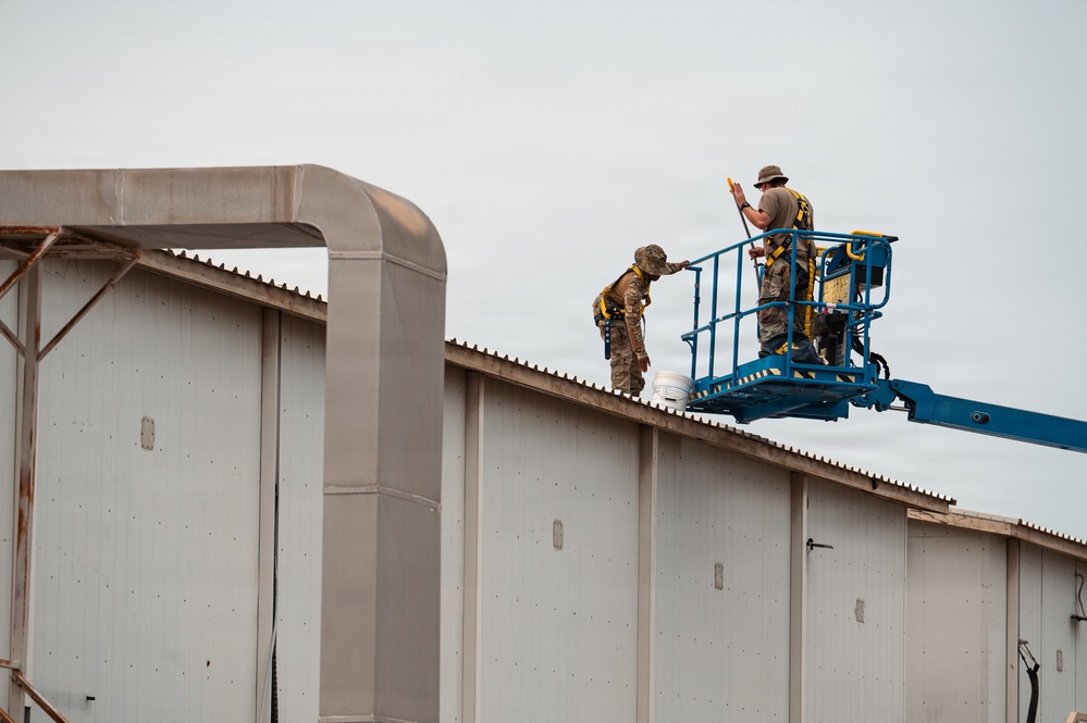 CE Airmen repair dorm roof