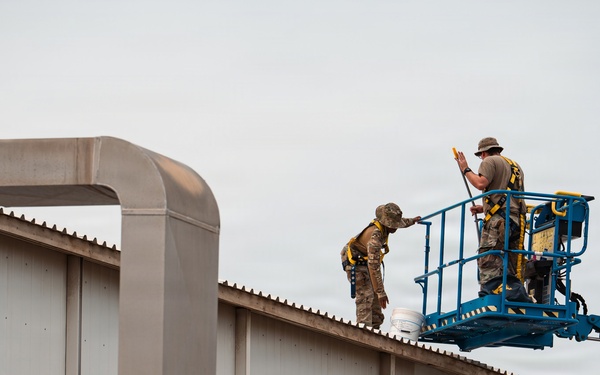 CE Airmen repair dorm roof