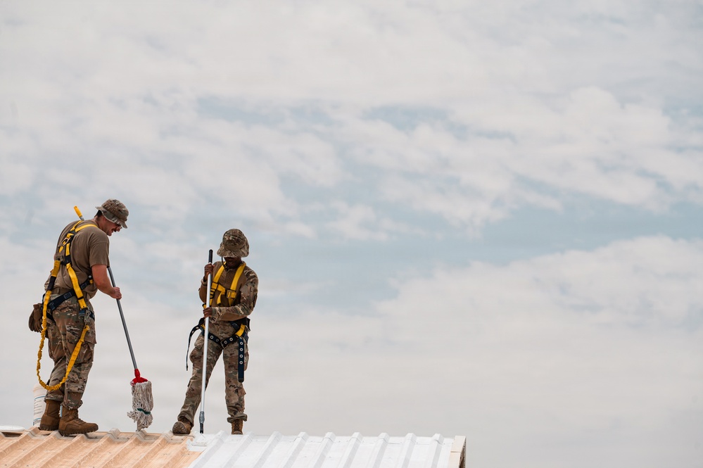 CE Airmen repair dorm roof