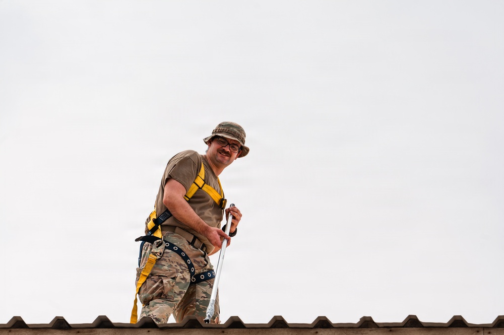 CE Airmen repair dorm roof