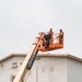 CE Airmen repair dorm roof