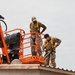 CE Airmen repair dorm roof
