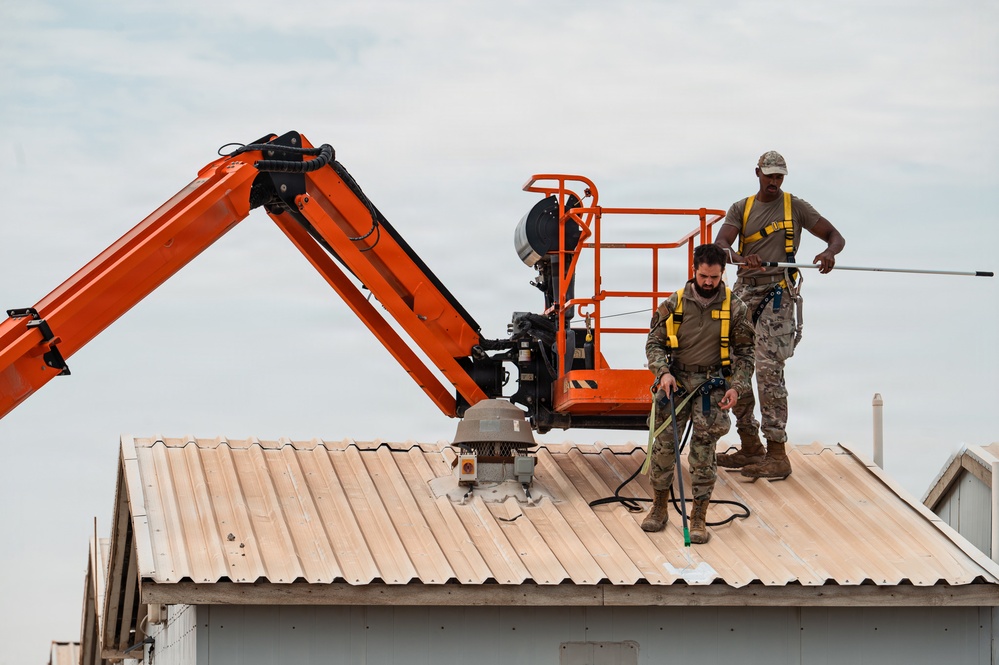 CE Airmen repair dorm roof