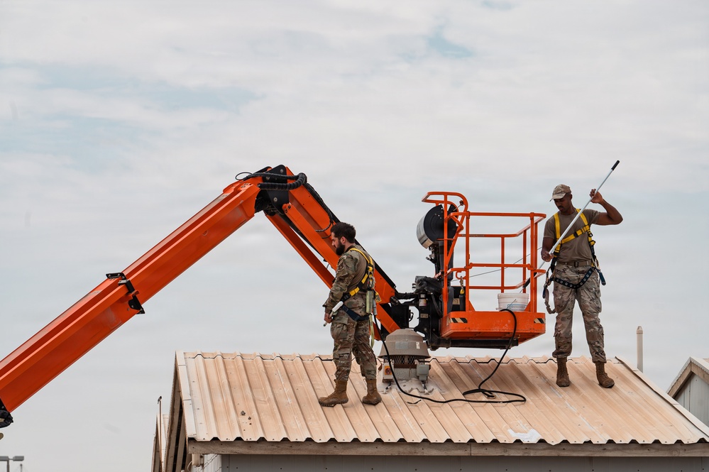 CE Airmen repair dorm roof