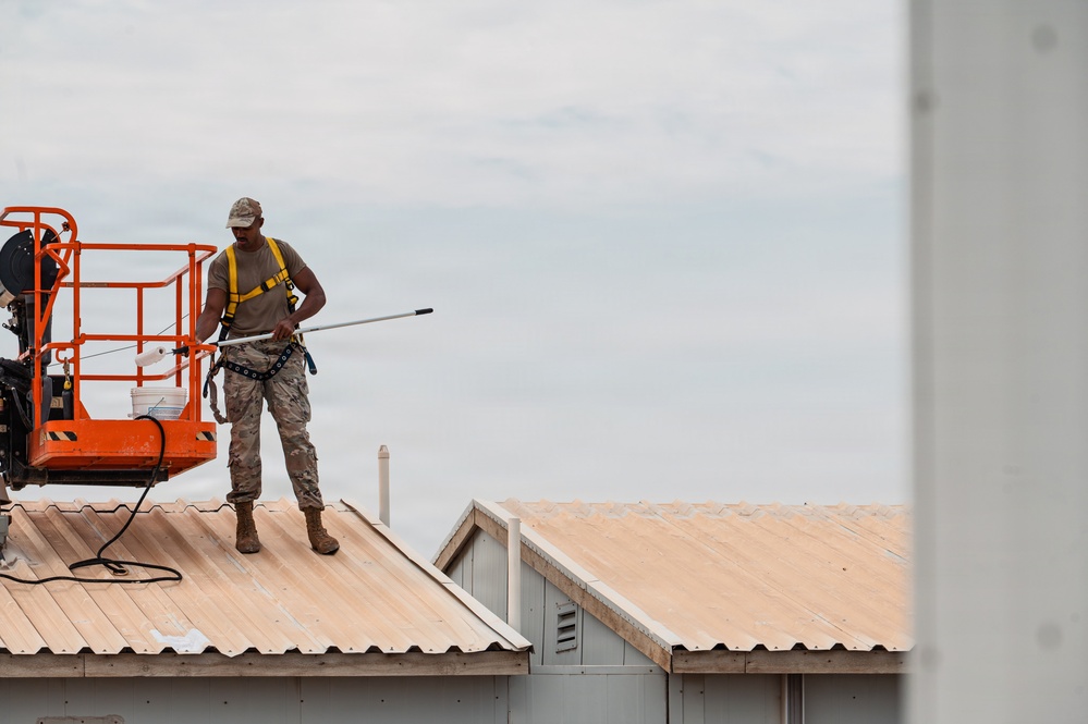 CE Airmen repair dorm roof