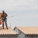 CE Airmen repair dorm roof