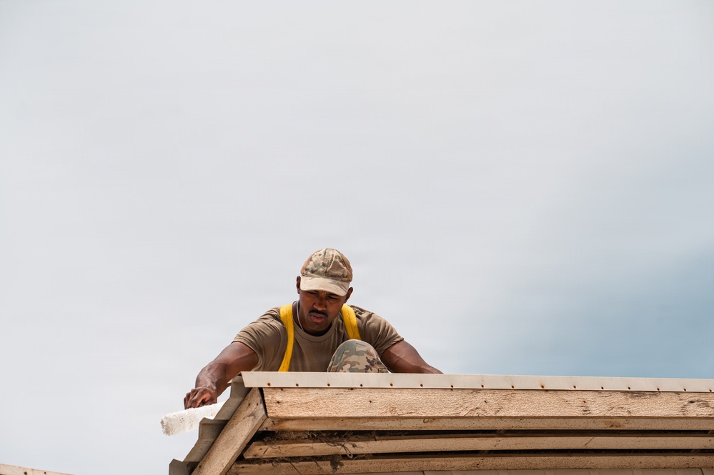 CE Airmen repair dorm roof