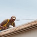 CE Airmen repair dorm roof