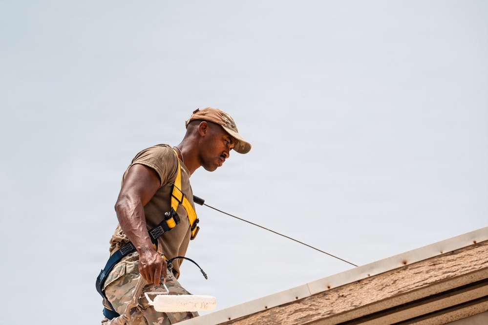 CE Airman repair dorm roof