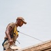 CE Airman repair dorm roof