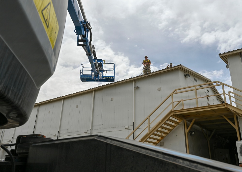 CE Airmen repair dorm roof