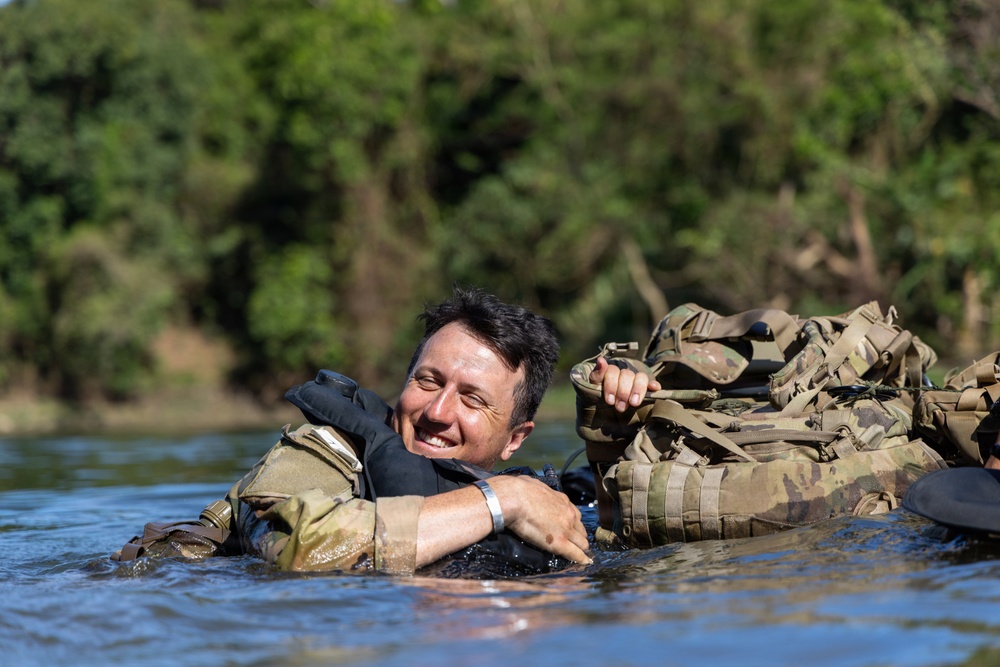 Balikatan 2026: U.S Soldiers,Armed Forces of the Philippines Special Forces soldiers ruck rafting in jungle school