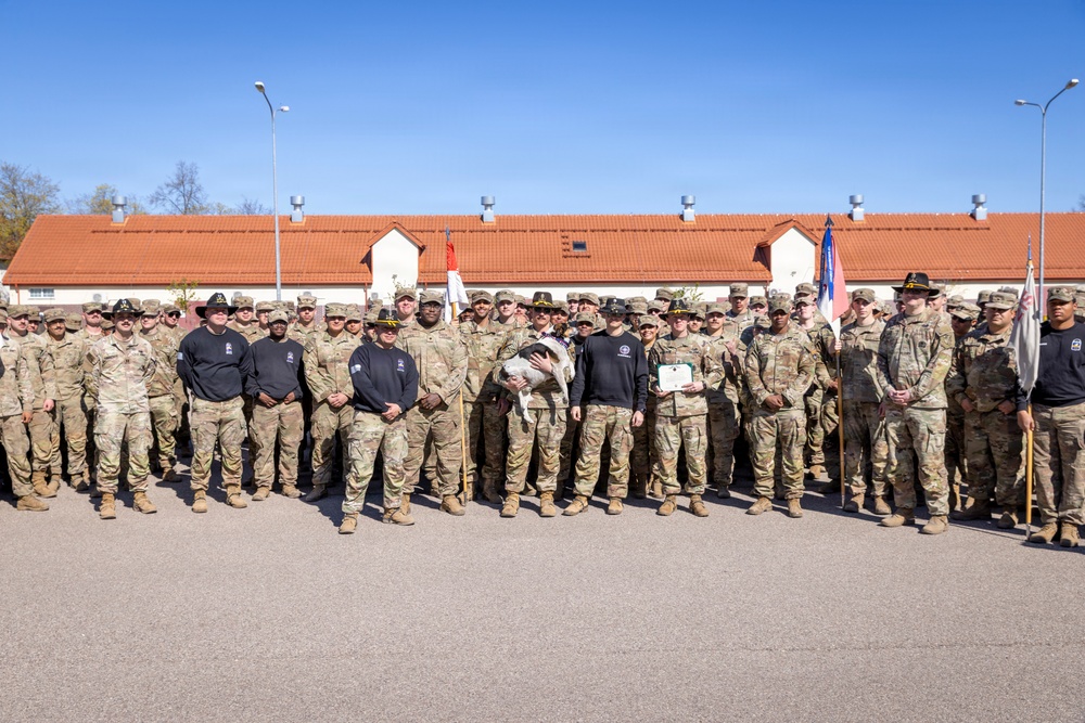 U.S. Soldiers of the NATO Forward Land Forces Battle Group-Poland award Chico the dog