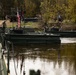 U.S. Soldiers traverse a wet gap crossing during Saber Strike