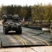 U.S. Soldiers traverse a wet gap crossing during Saber Strike
