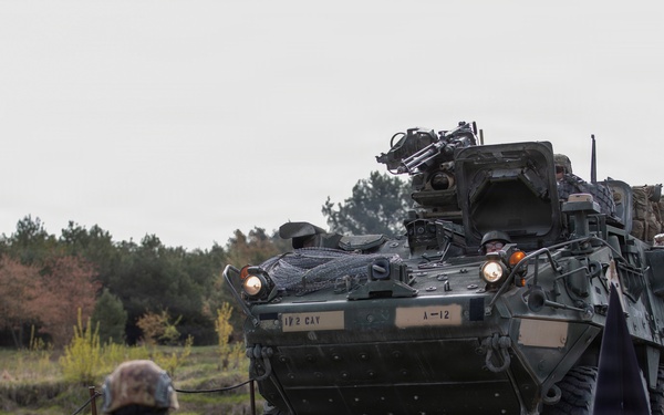 U.S. Soldiers from the 1st Squadron, 2d Cavalry Regiment, 809th Multi-Role Bridge Company, 15th Engineering Battalion, alongside Polish and Italian Armed Forces conduct a wet gap crossing