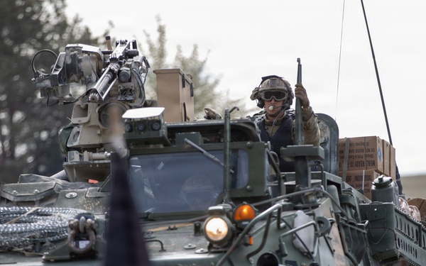 U.S. Soldiers from the 1st Squadron, 2d Cavalry Regiment, 809th Multi-Role Bridge Company, 15th Engineering Battalion, alongside Polish and Italian Armed Forces conduct a wet gap crossing