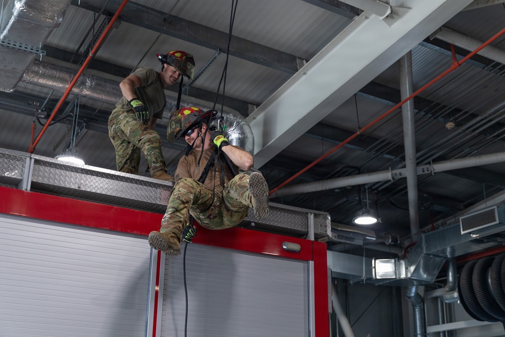 U.S. Army Firefighters conduct rappelling training