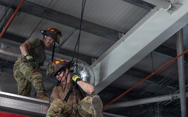 U.S. Army Firefighters conduct rappelling training