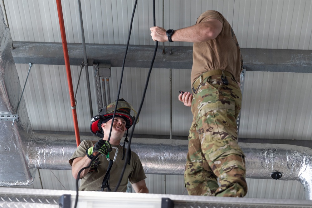 U.S. Army Firefighters conduct rappelling training