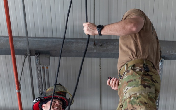 U.S. Army Firefighters conduct rappelling training