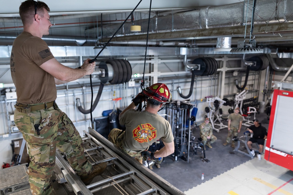 U.S. Army Firefighters conduct rappelling training